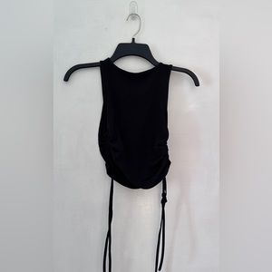 black tank with string tie on the sides
